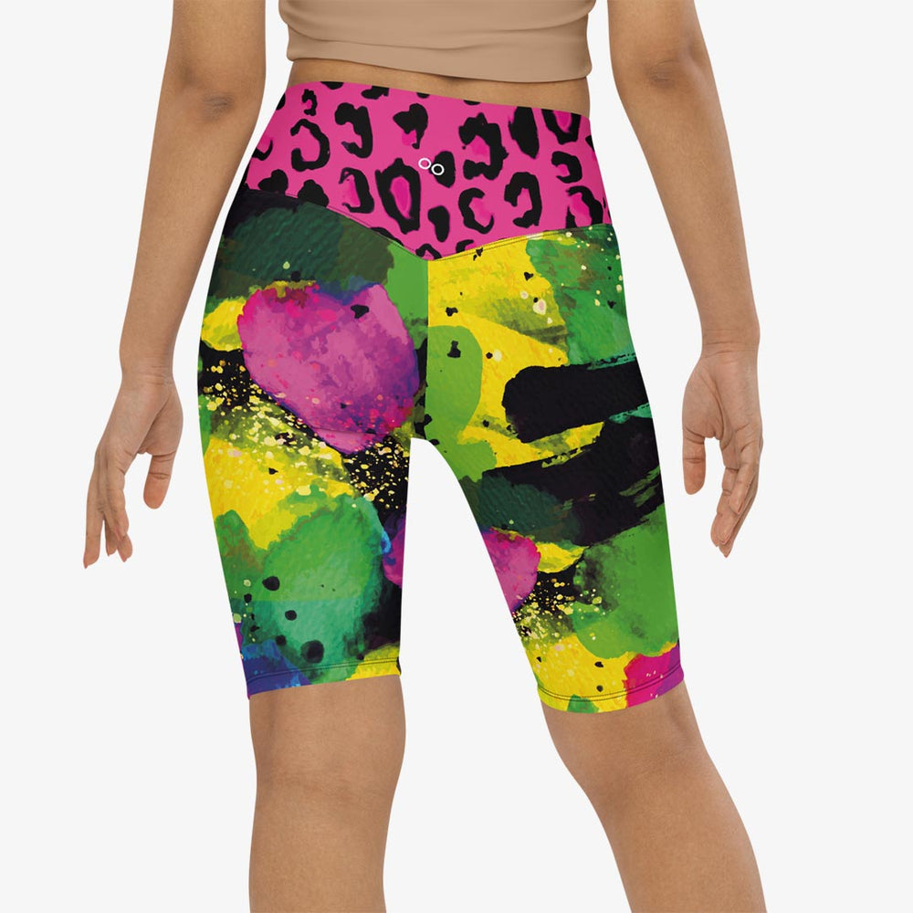 White biker shorts with abstract print on the back.