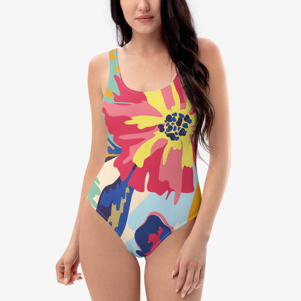Front view of one-piece swimsuit with abstract print.