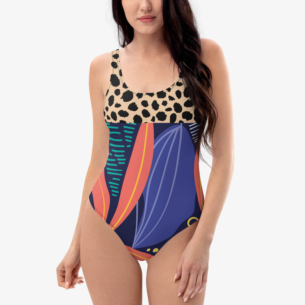 Another front view of one-piece swimsuit with abstract print.