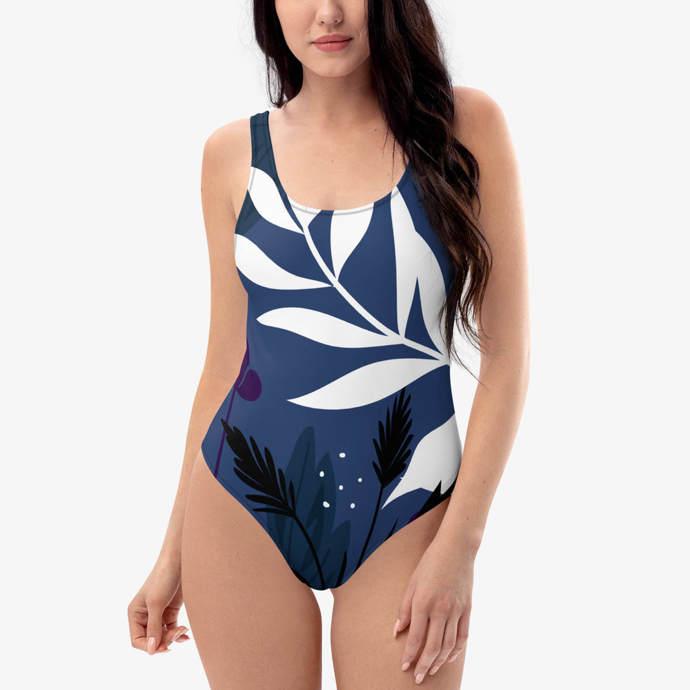 Front view of one-piece swimsuit with abstract print.