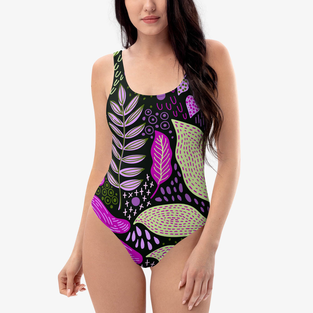 One-piece swimsuit with an all-over abstract print on the front.