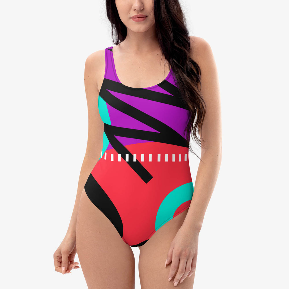 Front view of one-piece swimsuit with abstract print.
