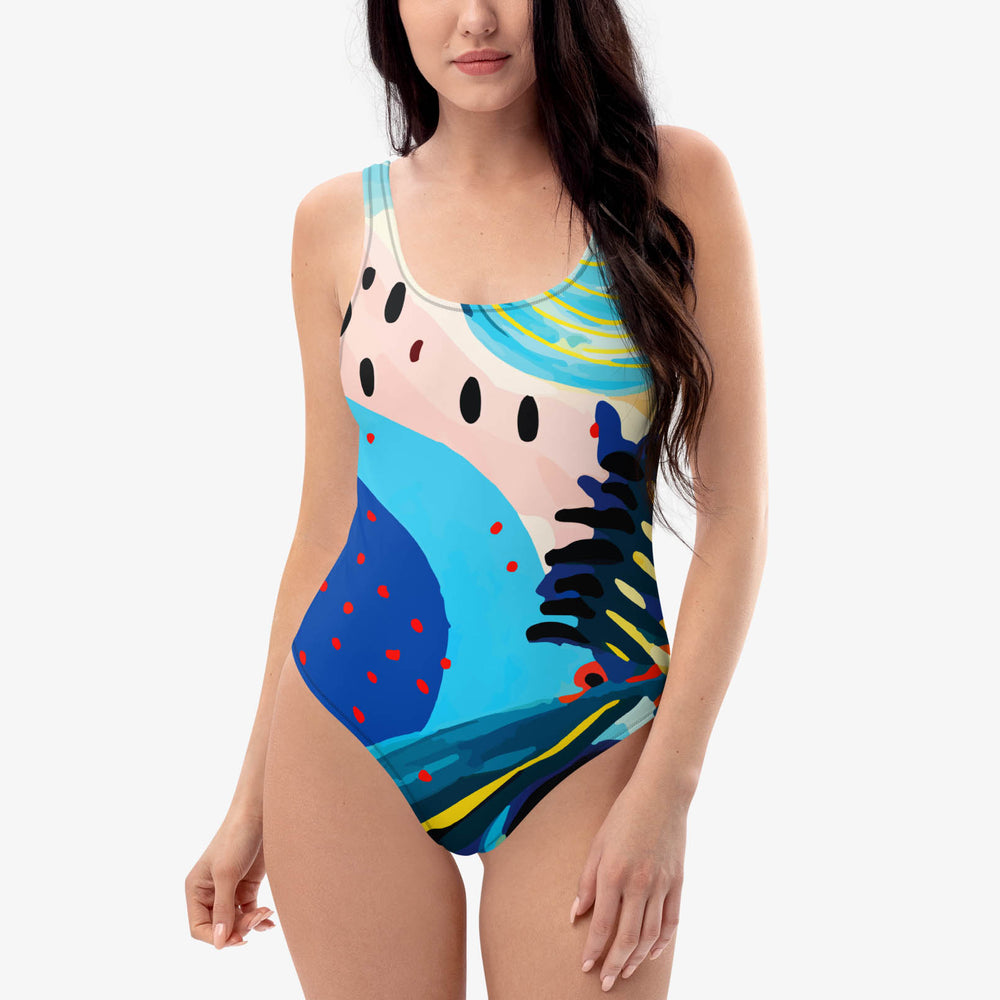 Front view of one-piece swimsuit with abstract print.