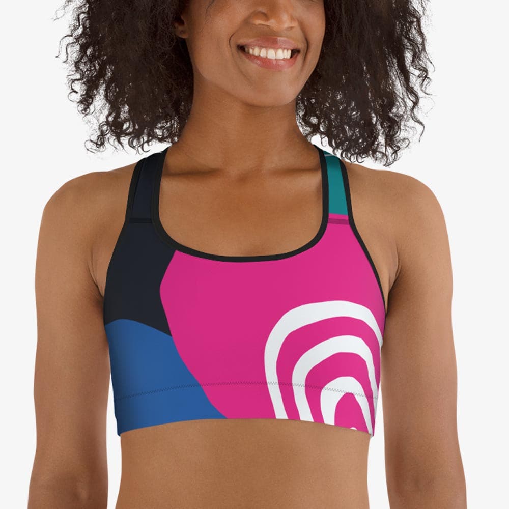 Close-up of black sports bra with abstract print, front view.