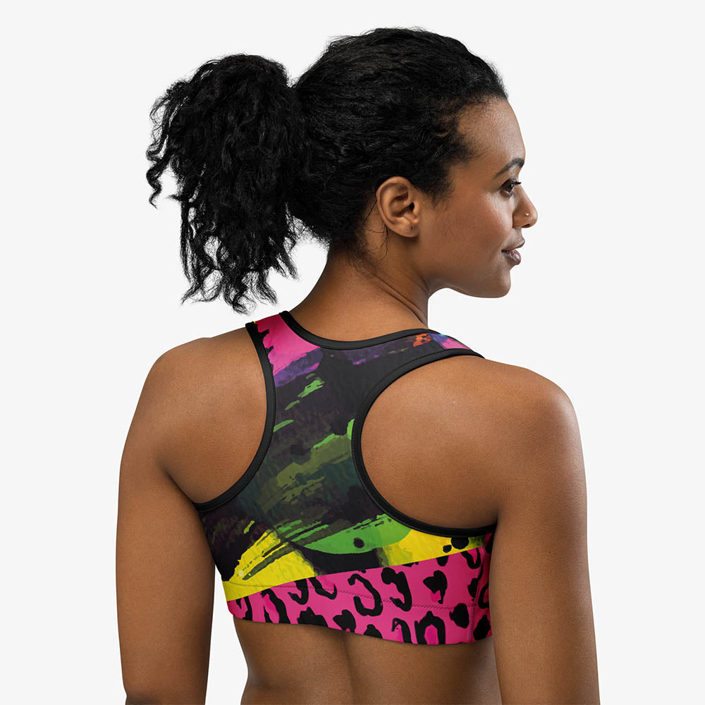 Close-up of black sports bra with all-over print, back view.