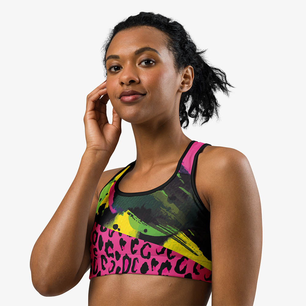 Black sports bra with an all-over print, front view.