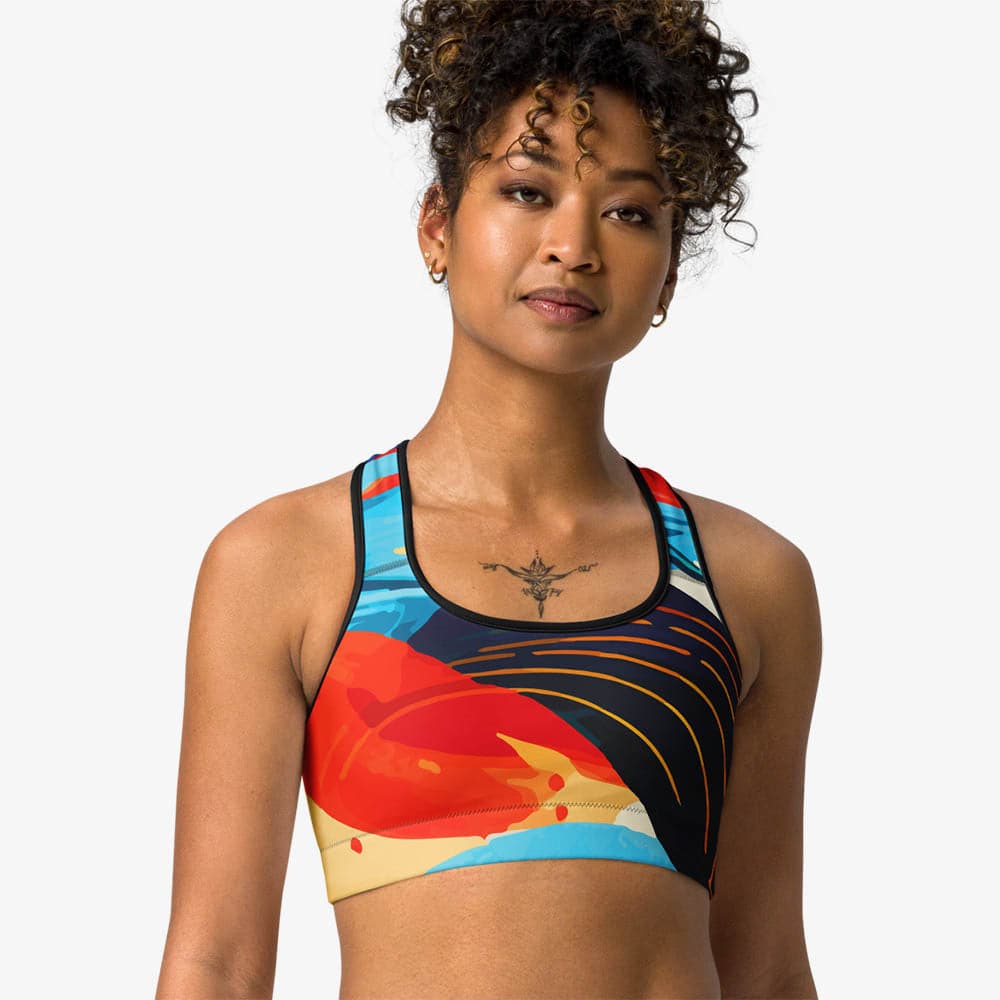 Front view of black sports bra with abstract print.
