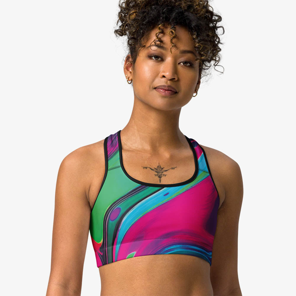 Close-up of black sports bra with abstract print, front view.