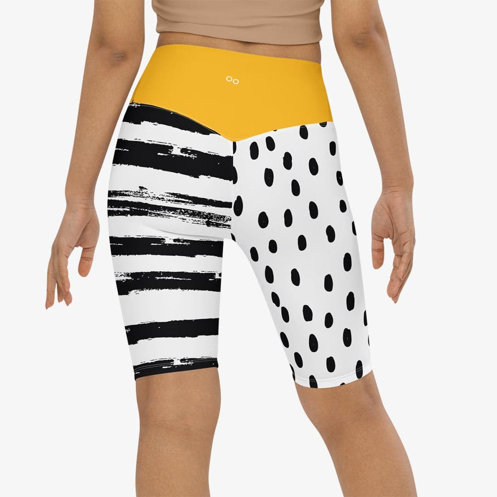 Back view of white biker shorts with abstract print.