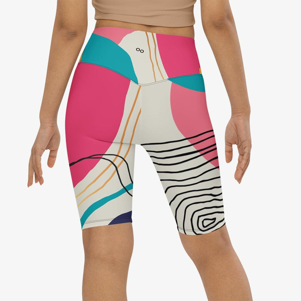 Back view of white biker shorts with abstract print.