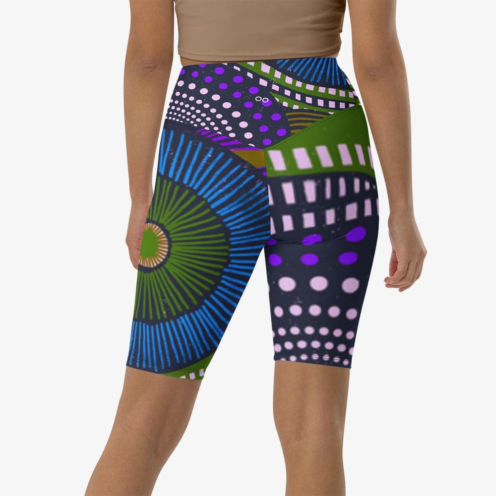Back view of white biker shorts with abstract print.