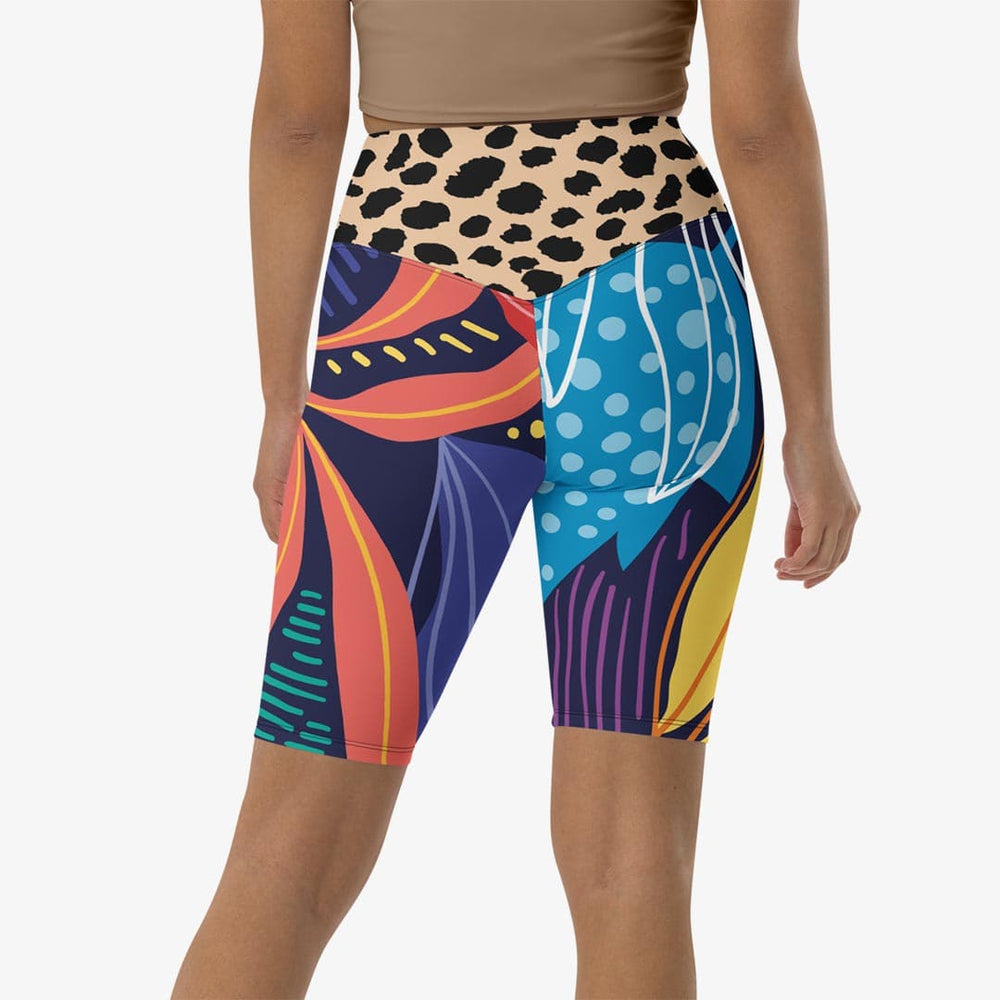 Back view of white biker shorts with abstract print.