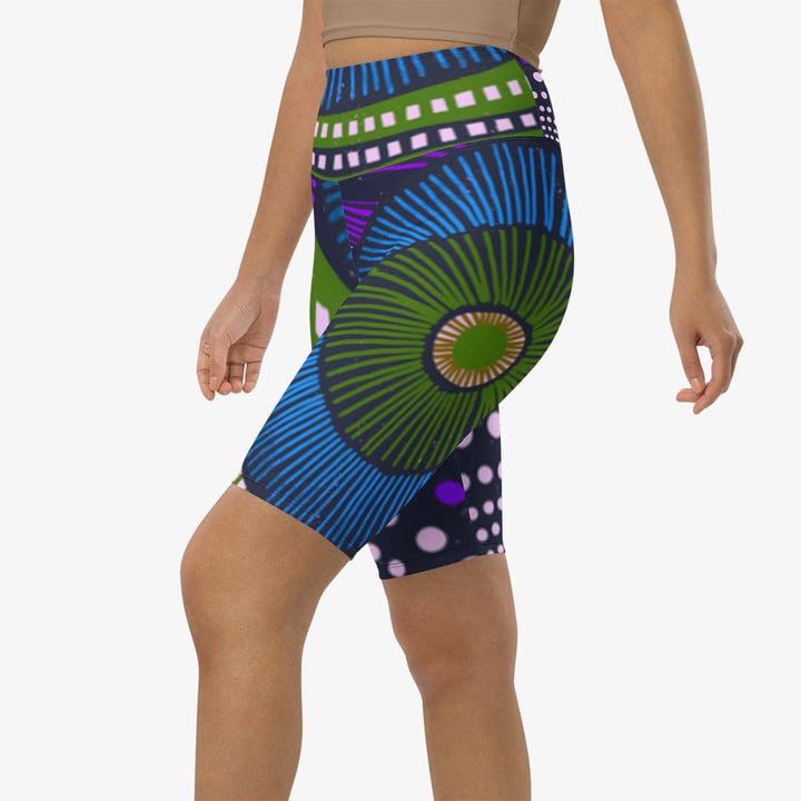 Left front view of white biker shorts with abstract print.
