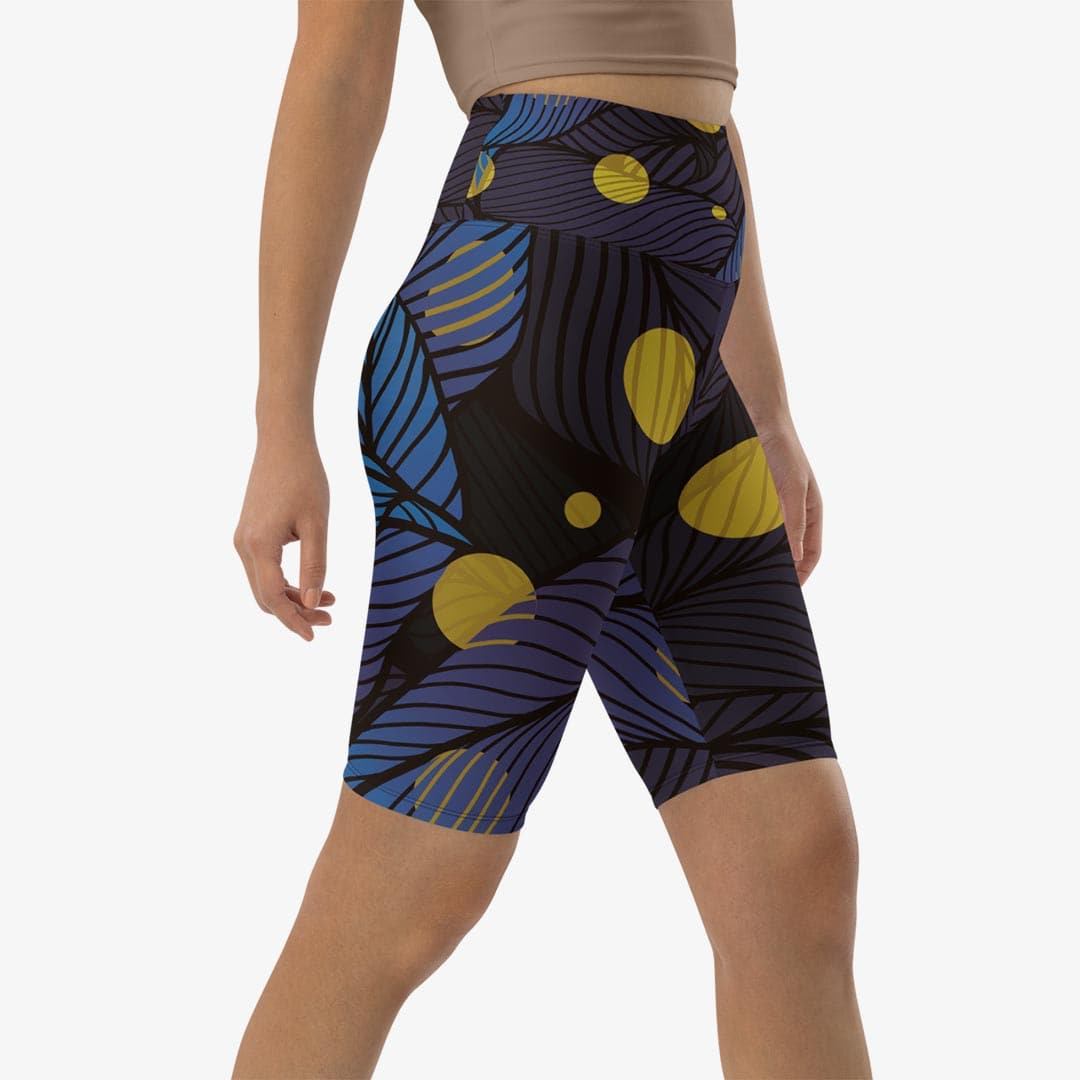 Right front view of white biker shorts with abstract print.