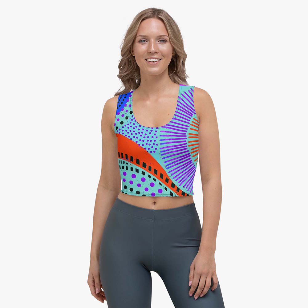 Front view of white crop top with abstract print.