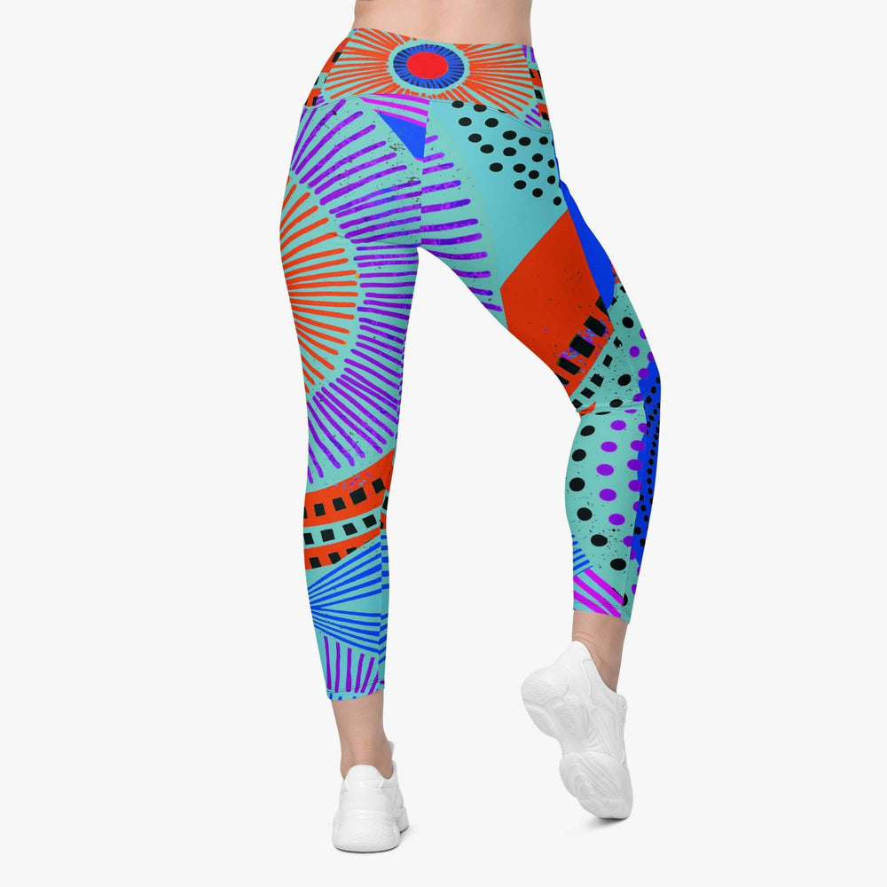 Back view of white leggings with pockets and abstract print.