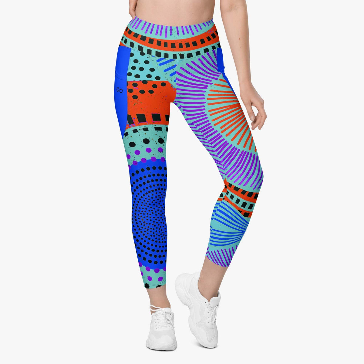 White leggings with pockets and abstract print, front view.