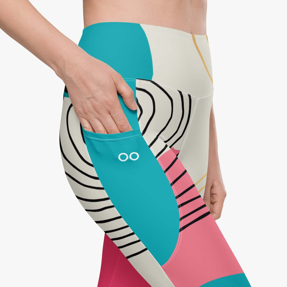 Leggings with pockets in blue and pink design.