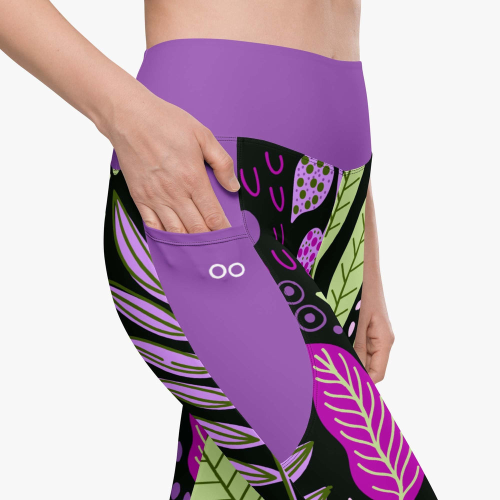 Product details of white leggings with pockets and abstract print.