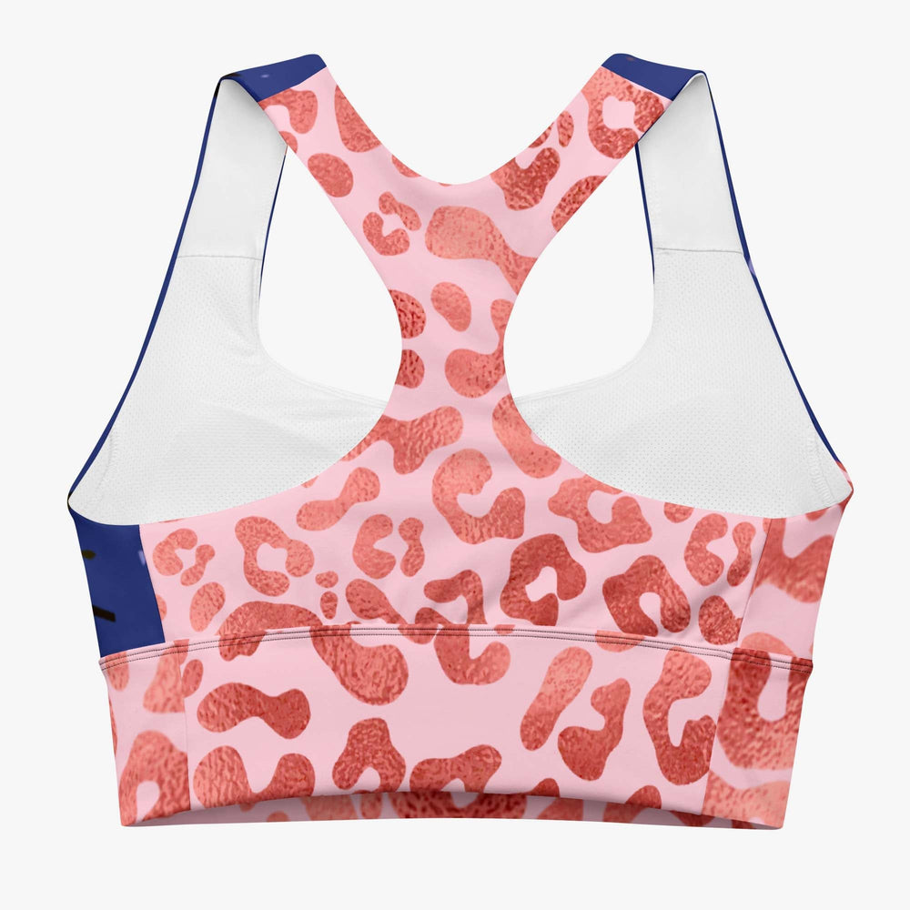 White longline sports bra with abstract print on the back.