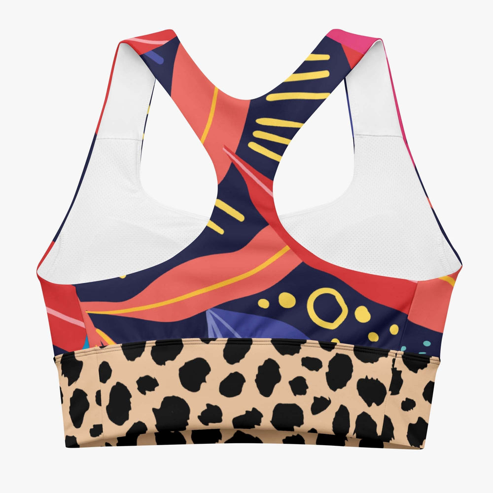 Back view of white longline sports bra with abstract print.