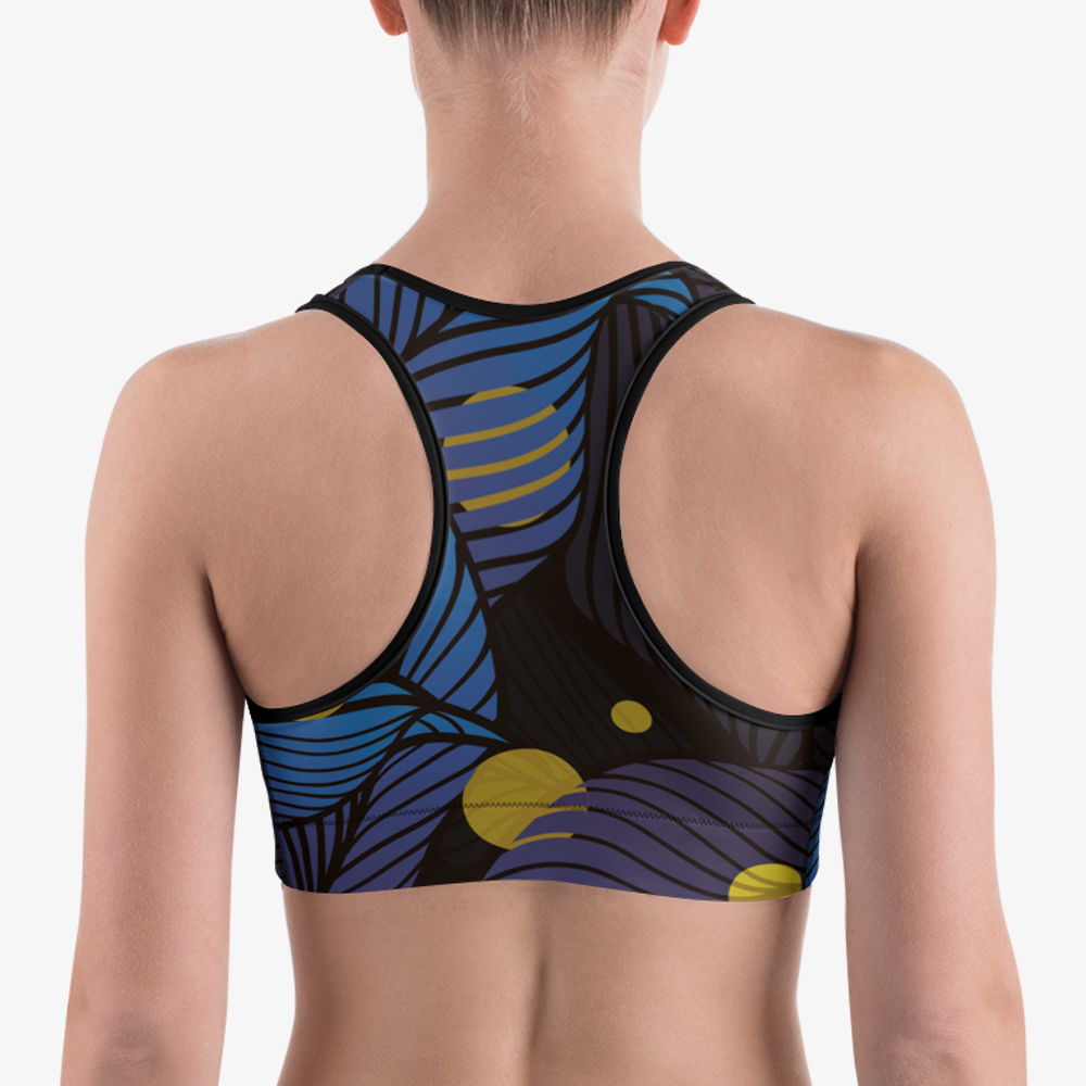 Back view of black sports bra with abstract print.
