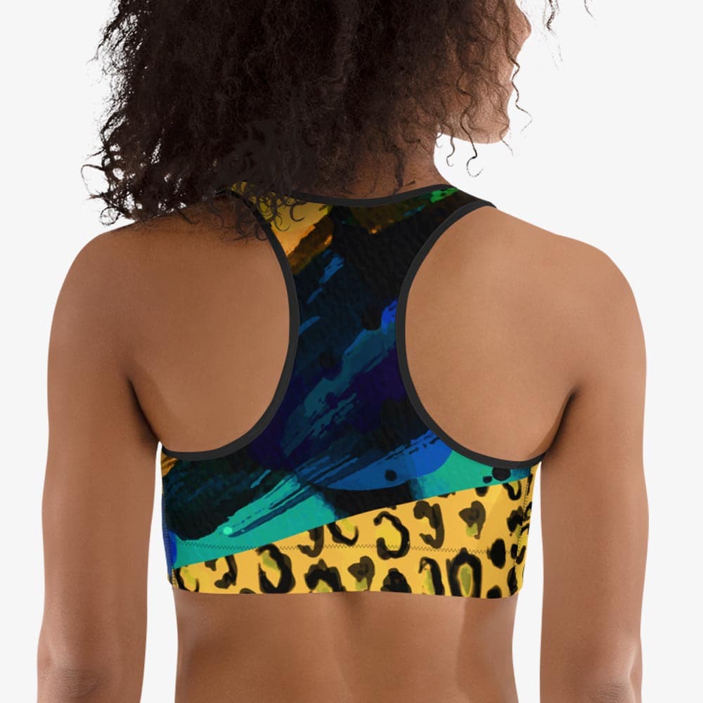 Black sports bra with abstract print, back view.