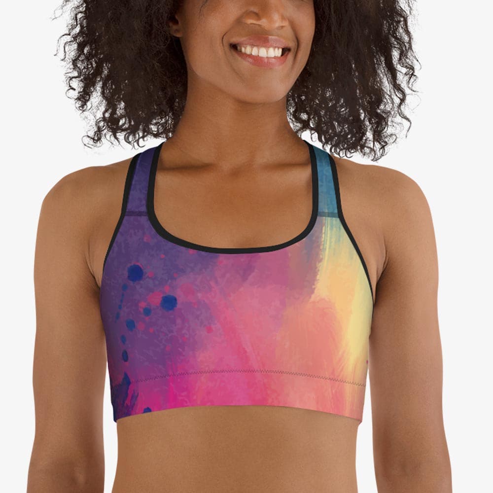 Black sports bra with an all-over abstract print, front view.