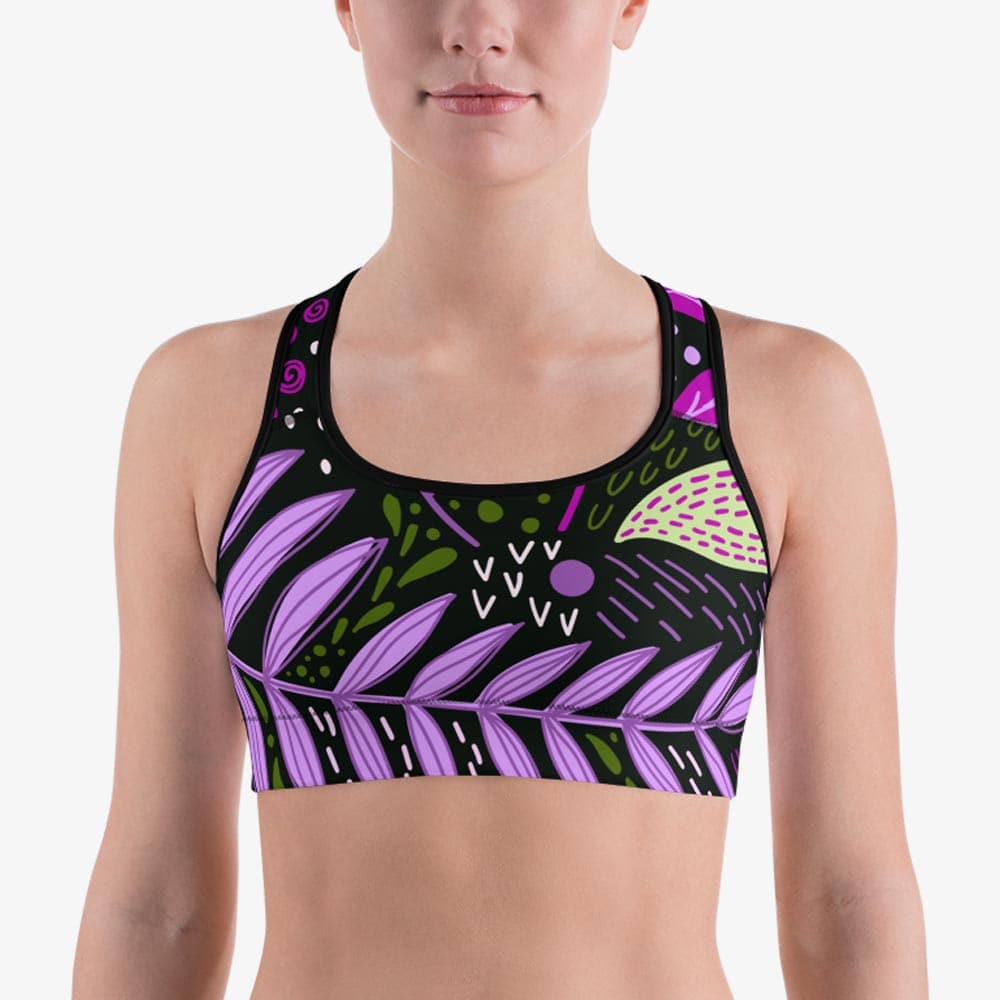 Front view of black sports bra with abstract print.