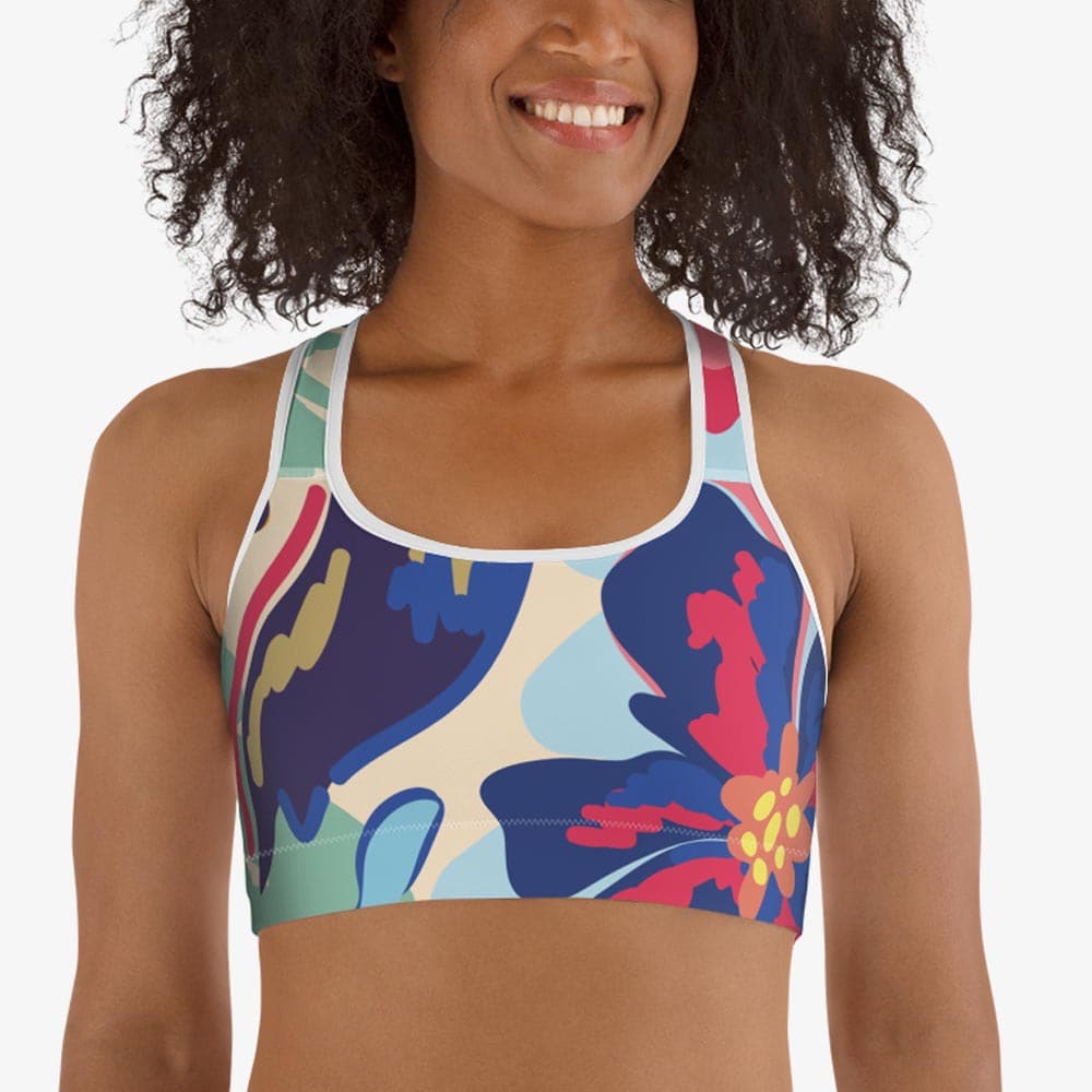 White sports bra with an all-over floral print, front view.