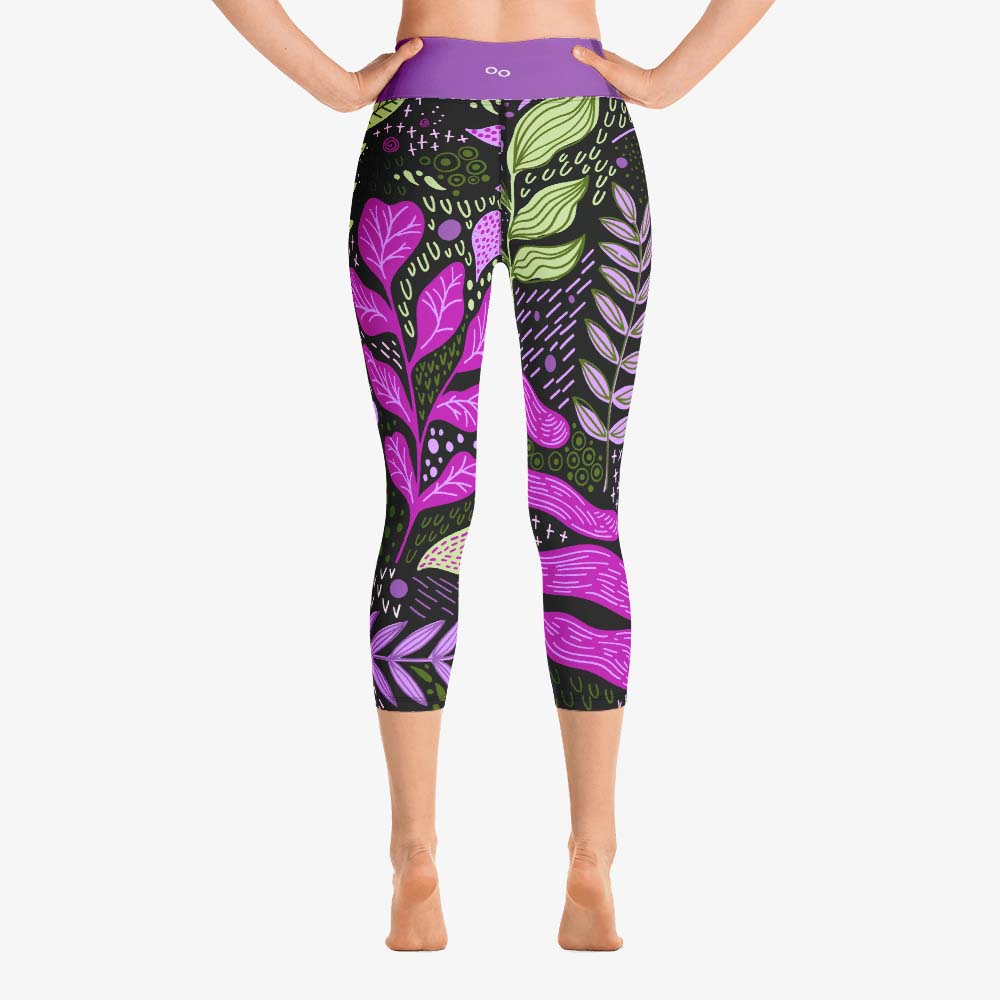 Detailed view of white yoga capri leggings with abstract print, back view.