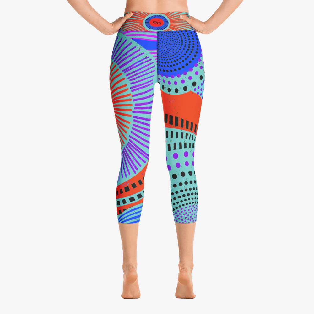 Back view of white yoga capri leggings with abstract print.