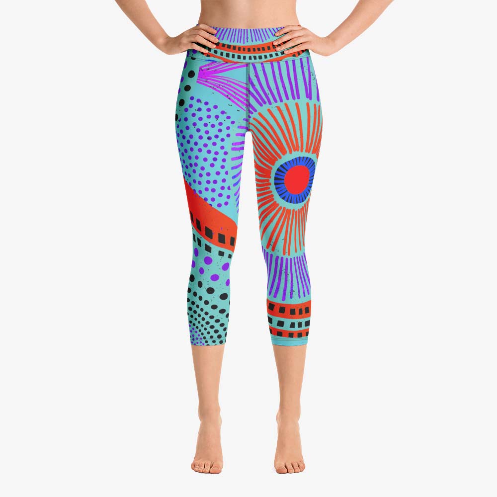 Front view of white yoga capri leggings with abstract print.