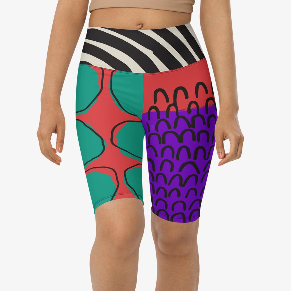 Front view of white biker shorts with abstract print.