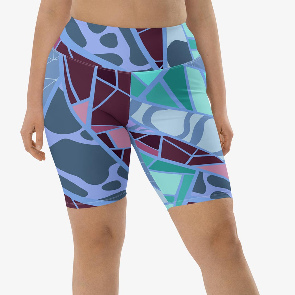 Front view of white biker shorts with abstract print.