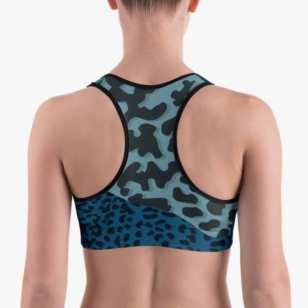 Back view of white crop top with abstract print.