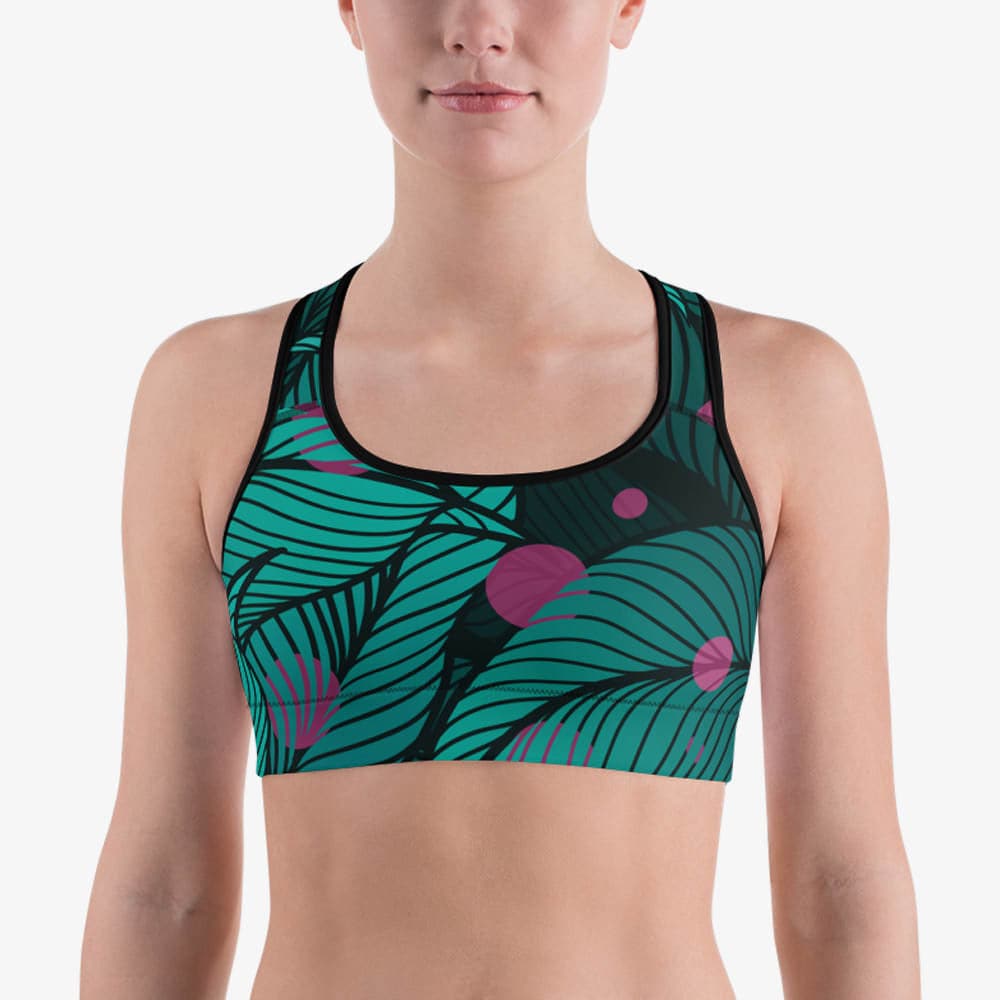 Detailed view of white tank top with abstract print, front view.